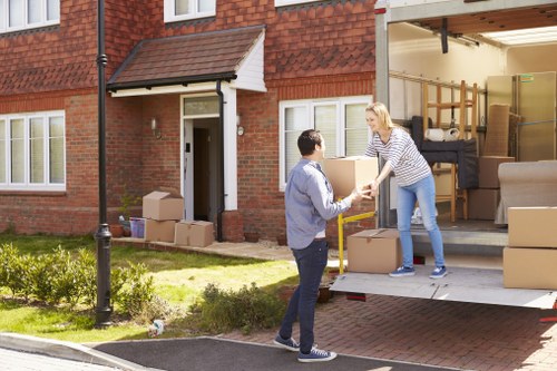 Team members reviewing modern slavery compliance in a removals business