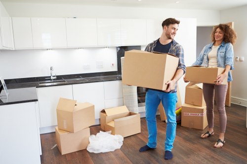 Furniture and boxes prepared for transport by van