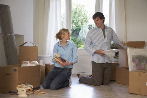 Packed moving boxes and furniture prepared for removals in Shepherdsbush