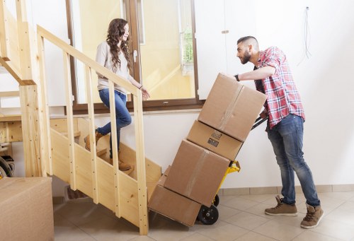 A careful Shepherdsbush removals team loading items securely